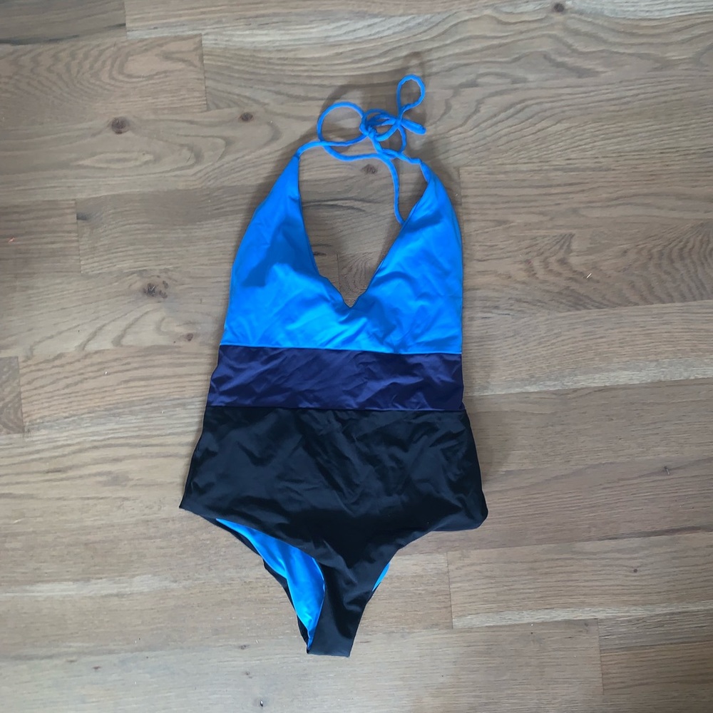 Never worn tavik one piece